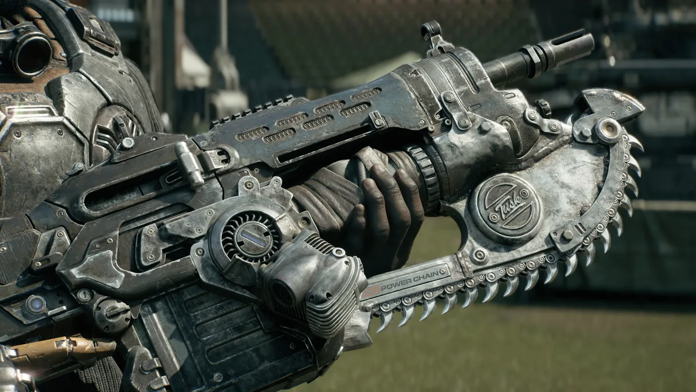 Primer plano de la motosierra Lancer, el arma insignia de Gears of War